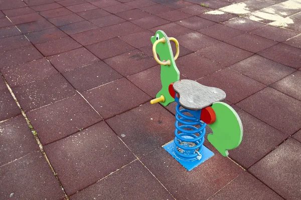 Toy horse in childrens playground — Stock Photo, Image