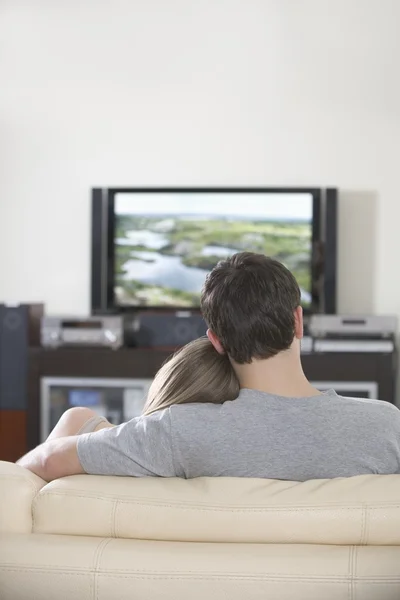 Couple watching television Stock Photo