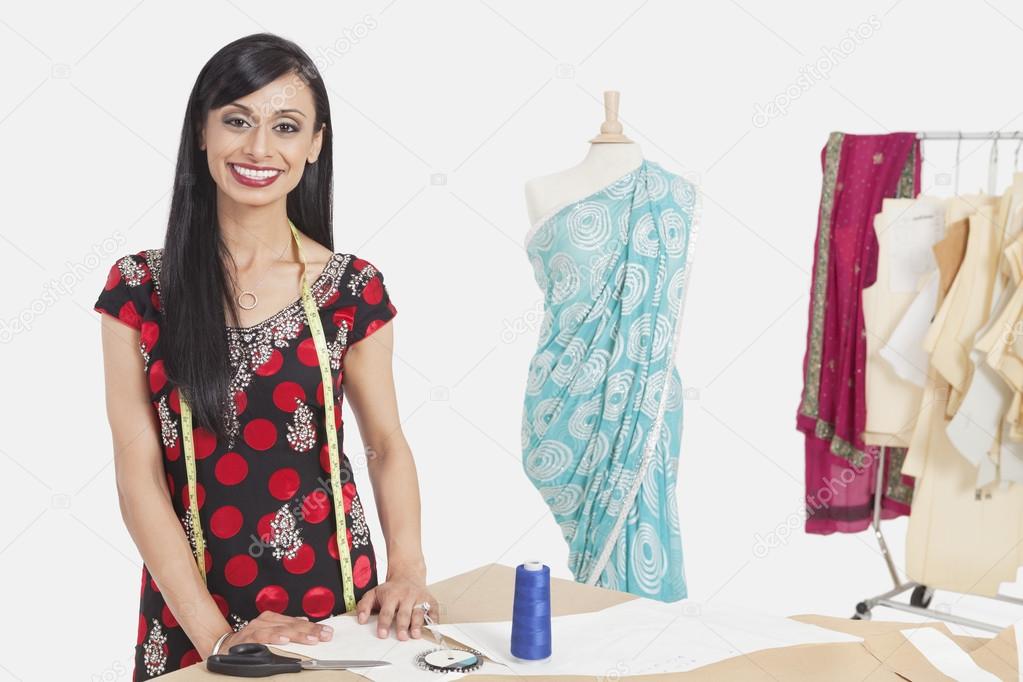 Indian female tailor smiling