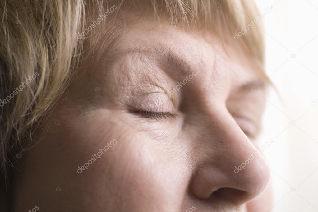 Mature woman skin around eyes