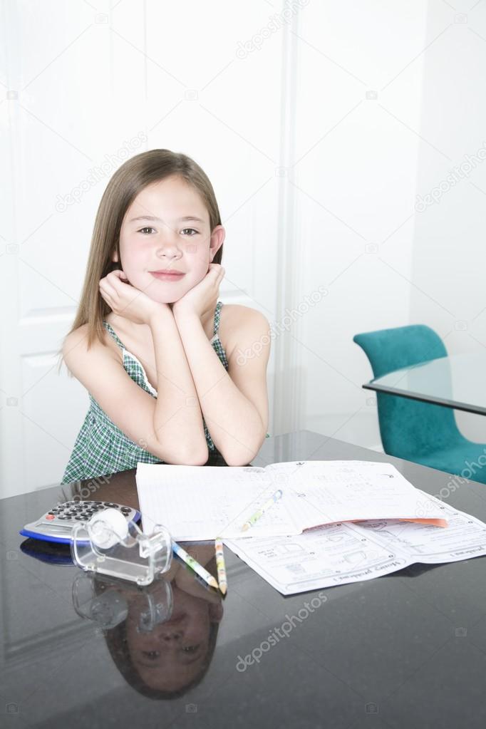 Young Teen doing her homework