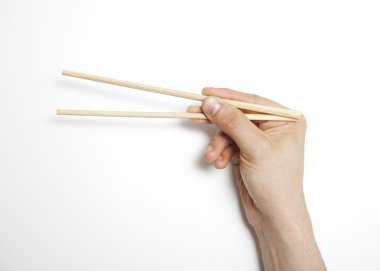 Adamın elini chopsticks sürükleyici