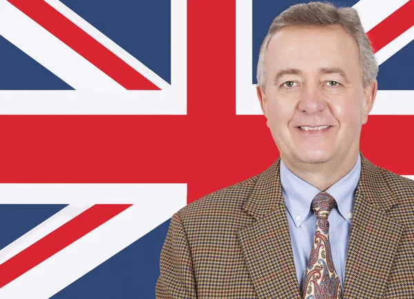 Businessman over British flag — Stock Photo, Image