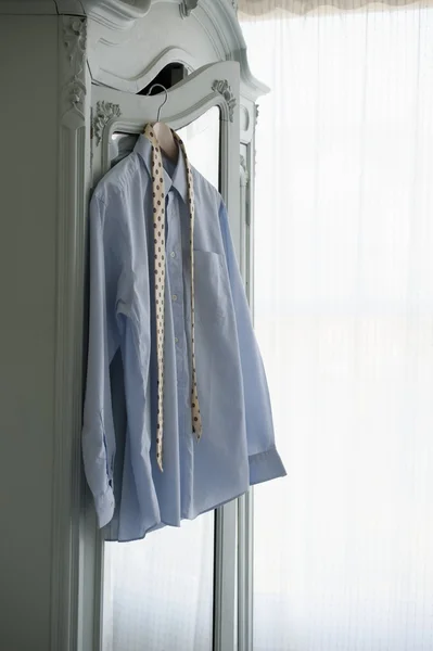 Shirt hang on wardrobe — Stock Photo, Image