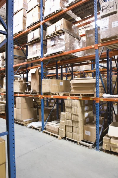 Boxes on shelves — Stock Photo, Image