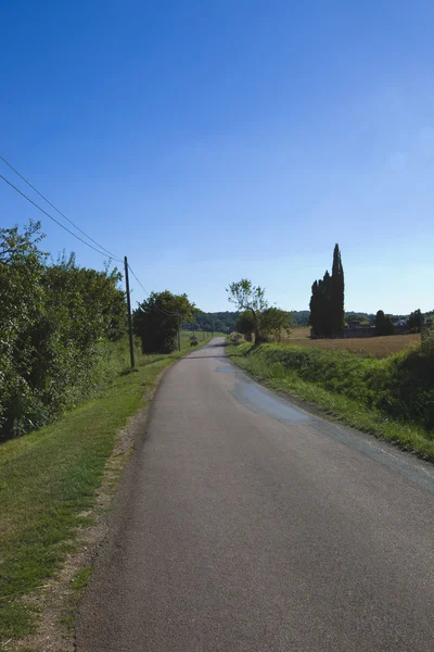 Empty rural road — Stockfoto