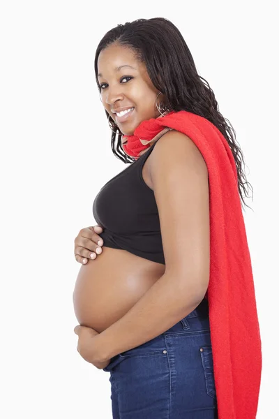 Pregnant woman wearing superhero cape — Stock Photo, Image