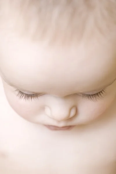 Baby looking down — Stock Photo, Image