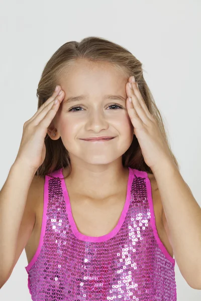 Confused girl with hands on head — Stock Photo, Image