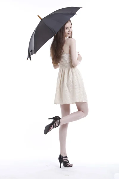 Žena v šatech s deštníkem — Stock fotografie