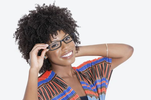 Woman in African print attire wearing glasses — Stock Photo, Image