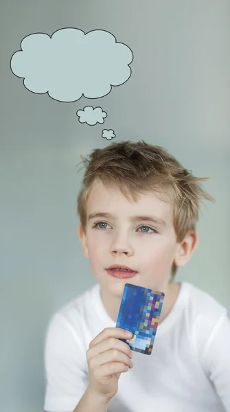 Boy holding credit card — Stock Photo, Image