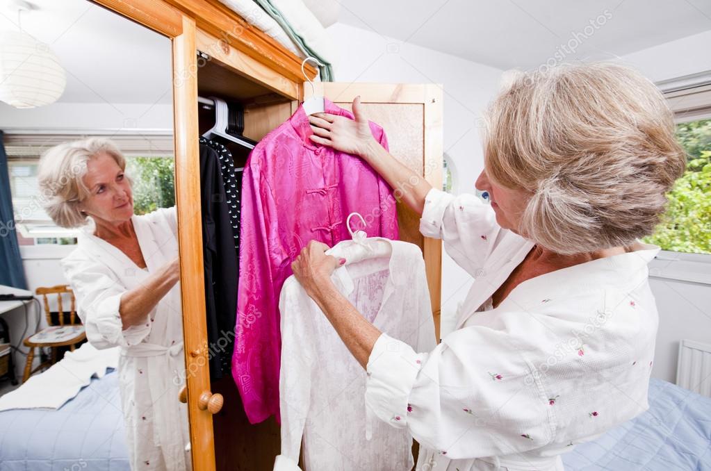 Senior woman choosing dress