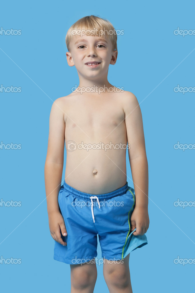 Young boy in swim trunks — Stock Photo © londondeposit #34014121
