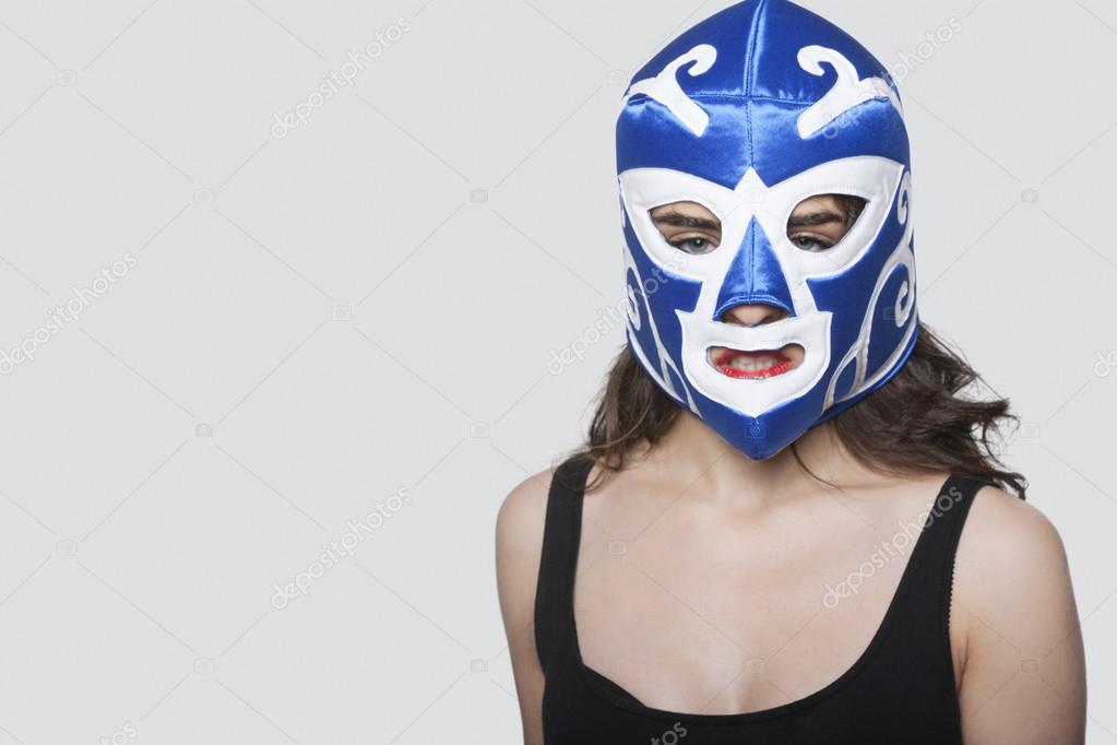 Woman wearing wrestling mask — Stock Photo © londondeposit 34014883