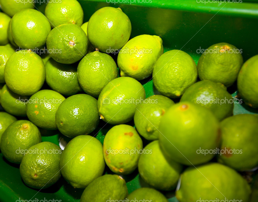 Green lemons on display Stock Photo by ©londondeposit 34017401