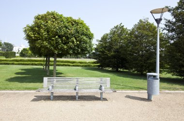 Wooden bench in London Park clipart