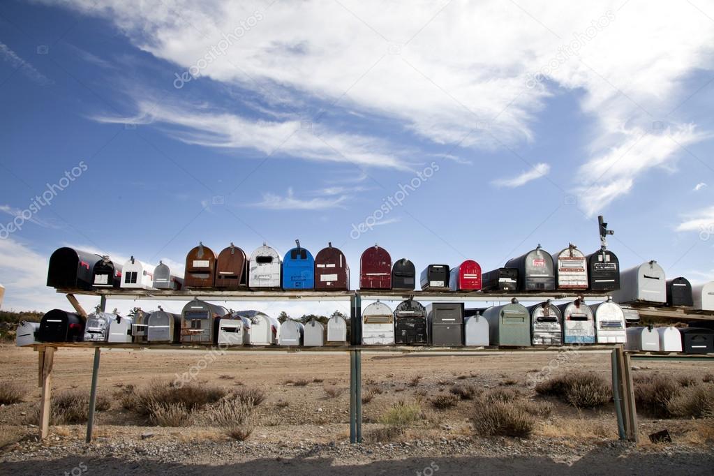 Rows of mailboxes in desert