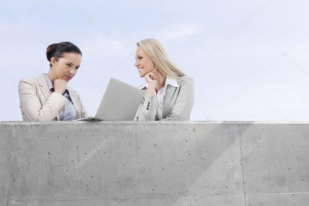 businesswoman using laptop