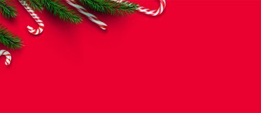 Kırmızı ve beyaz çizgili çubuklar, köknar dalları sınırında. Kırmızı arka plan. Mesaj için yer var. Vektör illüstrasyonu.