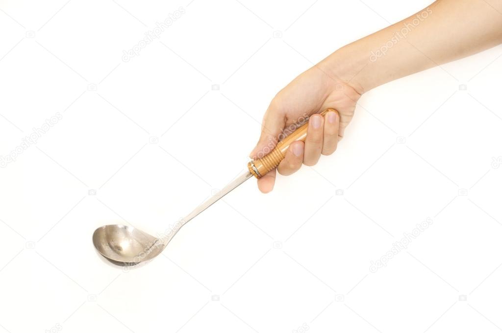 Isolated hand holding a ladle or big spoon for soup Stock Photo by ©mtkang  13781813