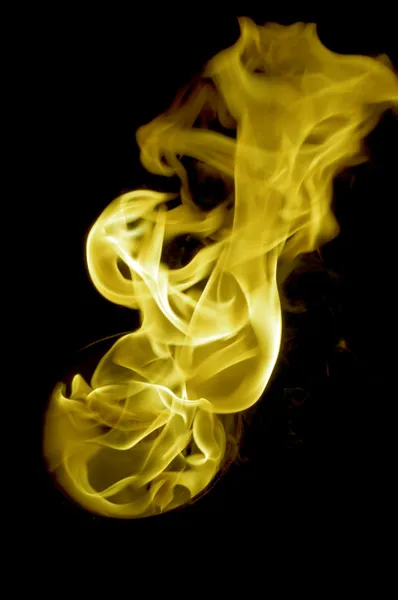 Isolated fire flames on black background, darkness — Stock Photo, Image