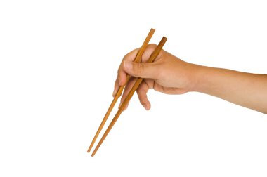 elini tutarak yemek çubuğu