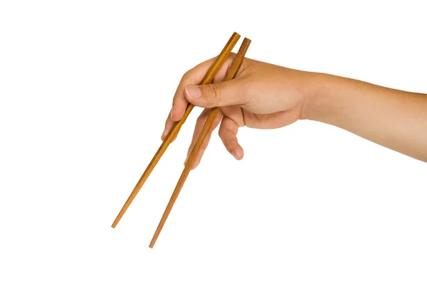 Hand som håller ätpinnar — Stockfoto