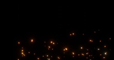 Video efekti için havada ateş közleri ya da kıvılcımlar uçuşuyor.