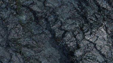 arkaplan için paslanma içeren toprak ya da kaya yüzey dokusu.