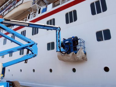 carnival cruise inspected by workers clipart