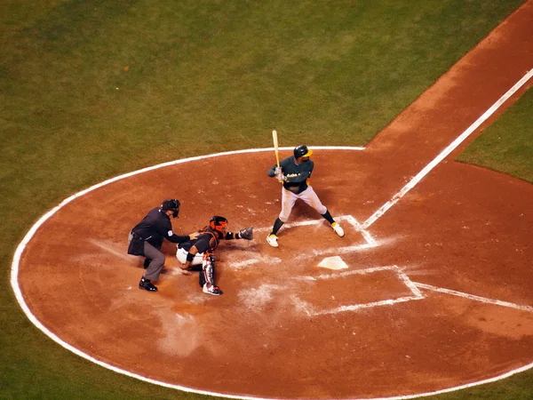 A's batter stands in batters box with catcher in postion — Stock Photo, Image