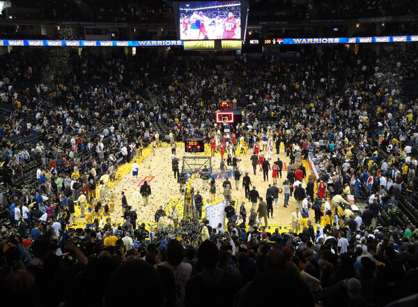 Basketball Players celebrate the finishing of game