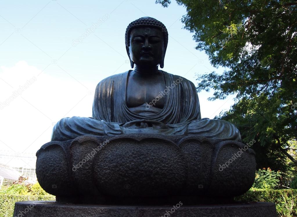 Seated Buddha Statue in Foster Botanical Garden