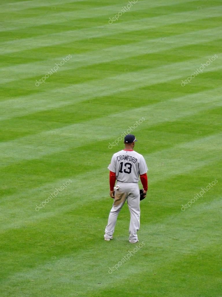 Red Sox Outfielder number 13 Carl Crawford stand in outfield Stock