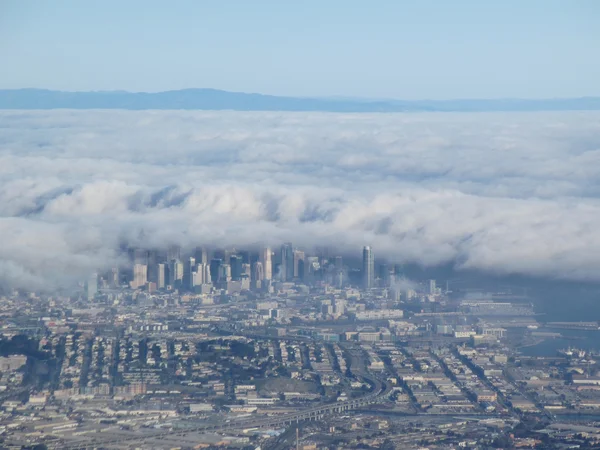 Downtown San Francisco aerial view taken from an airplane as fog — Stock Photo, Image