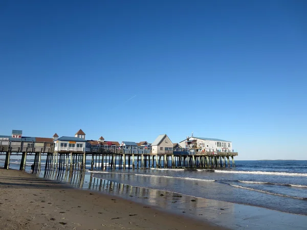 Waves lap Historic Old Orchard Beach Pier — Stock Photo, Image