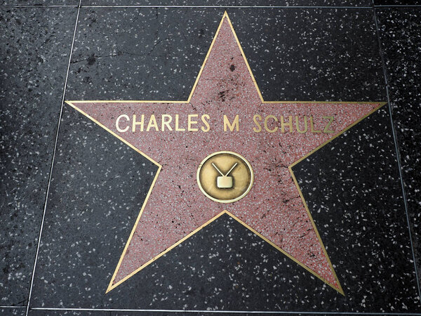 Hollywood, California - October 16, 2019: Charles M Schulz star with TV Logo on Hollywood Walk of Fame. This star is located on Hollywood Blvd. and is one of 2700 celebrity stars.