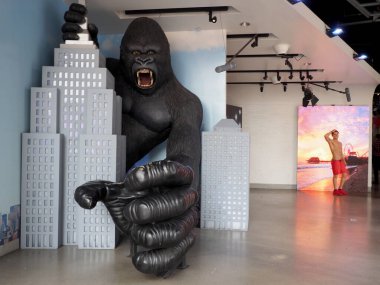 Hollywood, California - October 16, 2019: King Kong on empire state building and Baywatch Lifeguard on display at the Madame Tussauds Hollywood.