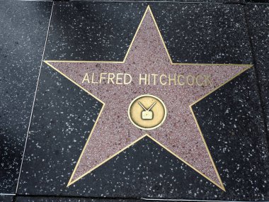 Hollywood, California - October 16, 2019: Director Alfred Hitchcock star with TV Logo on Hollywood Walk of Fame. This star is located on Hollywood Blvd. and is one of 2700 celebrity stars.