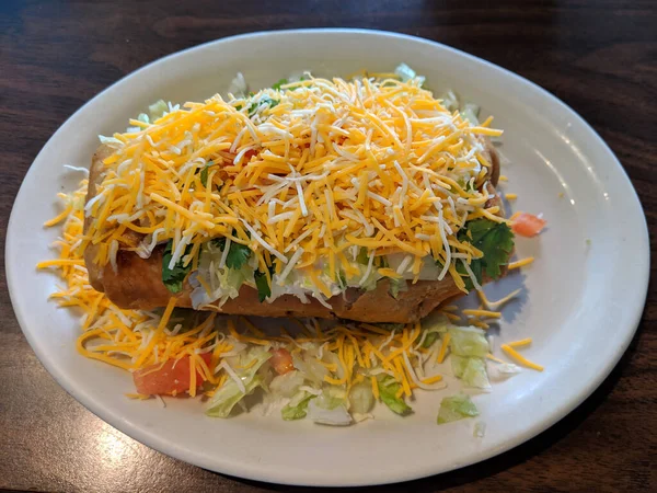 Chimichanga Covered Sour Cream Cheese Lettuce Tomatoes Table — Stock Fotó