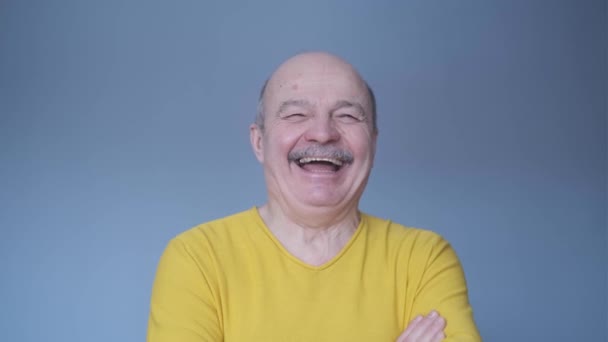 Senior hispanic man looking confident at camera smiling. — ストック動画