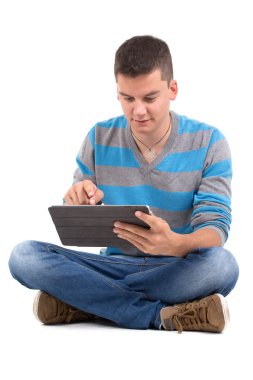 tablet ile genç çocuk