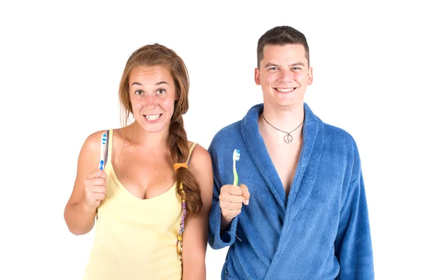 Niña y niño con cepillos de dientes —  Fotos de Stock