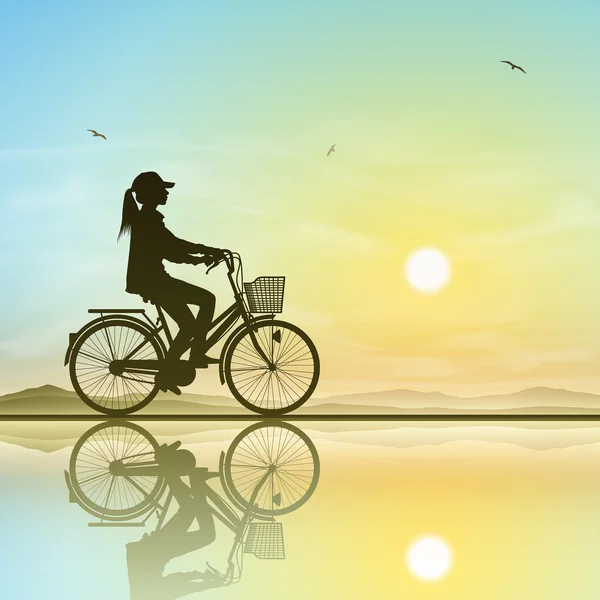 Chica en una bicicleta — Vector de stock