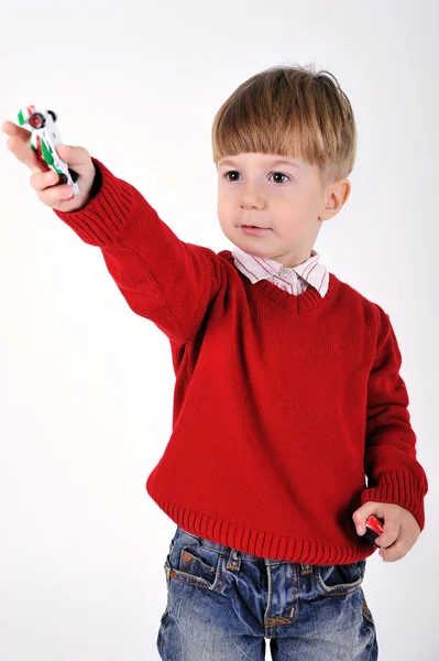 Kind met verhoogde hand — Stockfoto