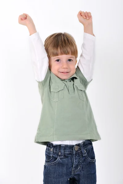 Criança com as mãos levantadas — Fotografia de Stock