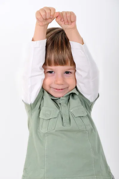 子供の手を上げて — ストック写真