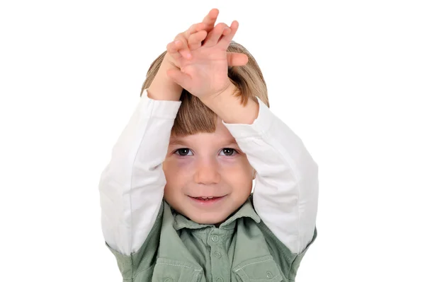 Kind met handen aan de orde gesteld — Stockfoto