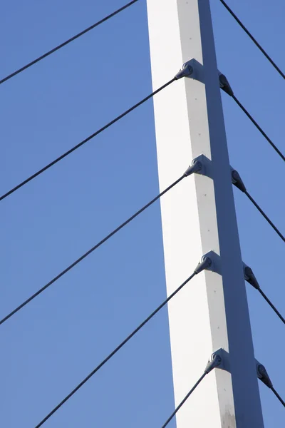 Bridge support against a blue sky — Stock Photo, Image